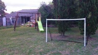 Slide, swings and football goal
